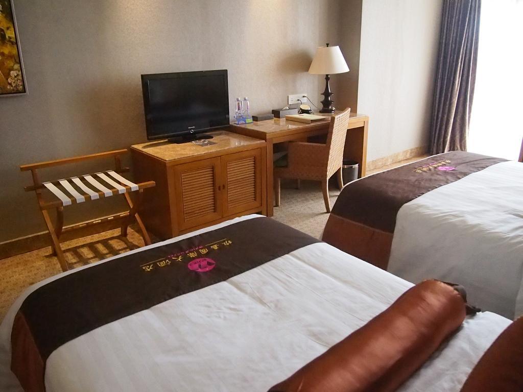 Wenchang Waika Hotel Quarto foto